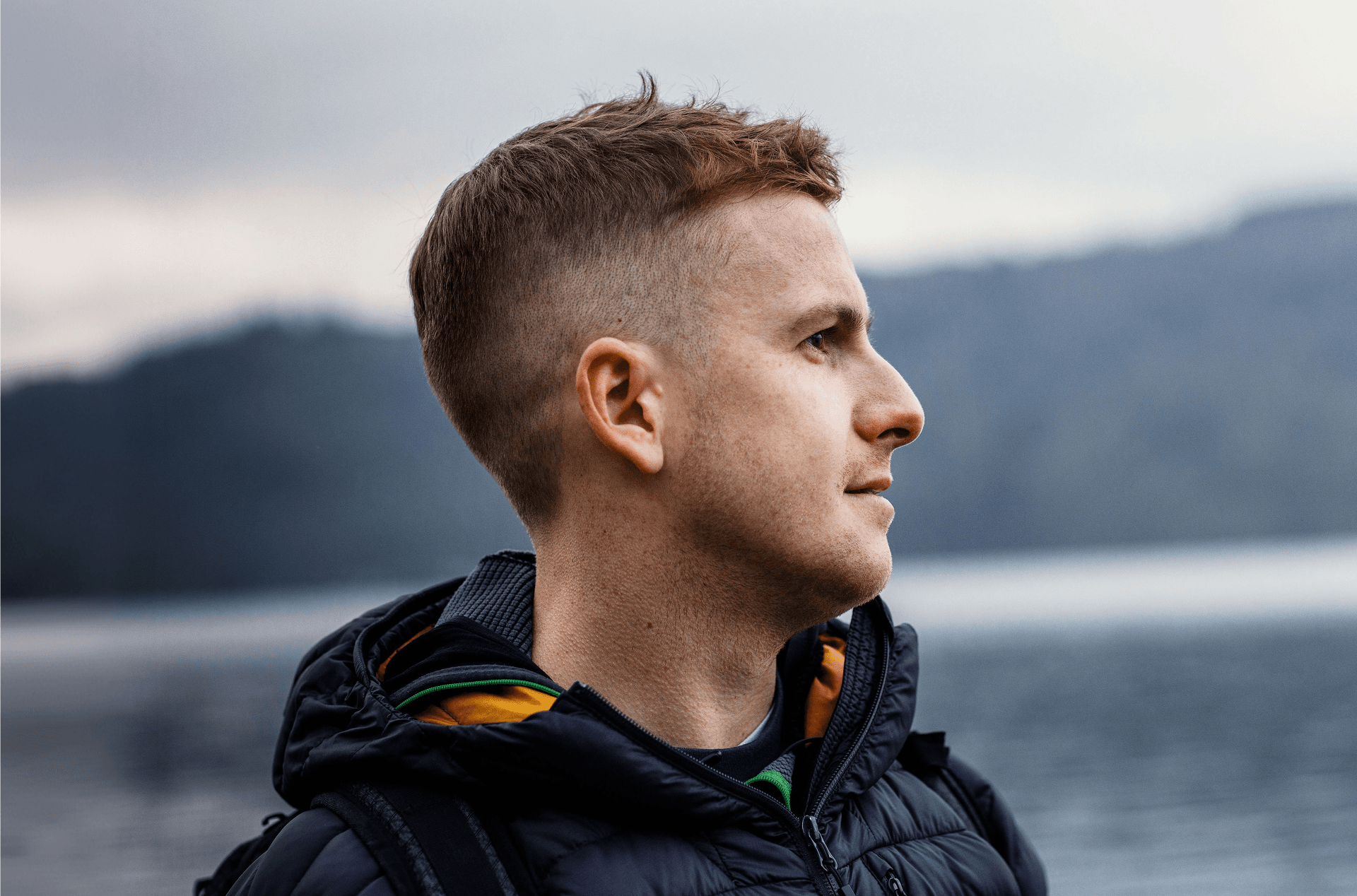 Portrait of man looking out at the sea